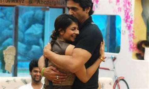 bigg boss 7 armaan lifts and kisses tanisha after his return in the house view pics