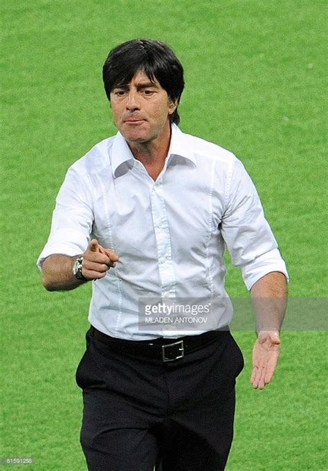 german coach joachim loew leaves the pitch after being ordered out along with austrian coach