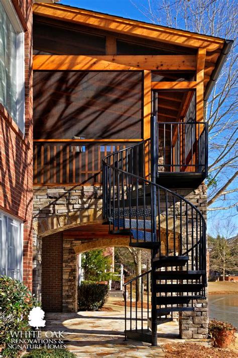 Screened In Porch With A Spiral Staircase By White Oak Renovations