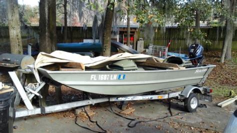 12 Seaark Aluminum Jon Boat With Galvanized Trailer And 35 Hp Motor For