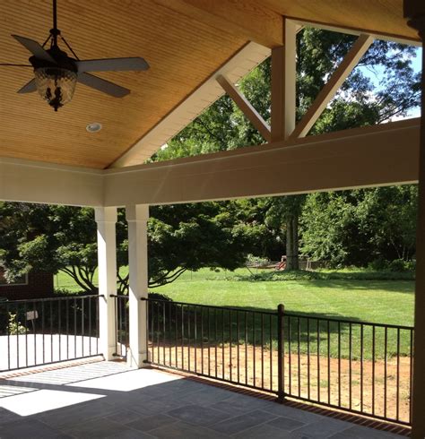 Covered Porch in Raleigh over a Limestone patio | House with porch