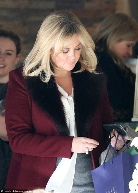 Samantha Armytage In A Fur Lined Coat And Knee High Boots Before