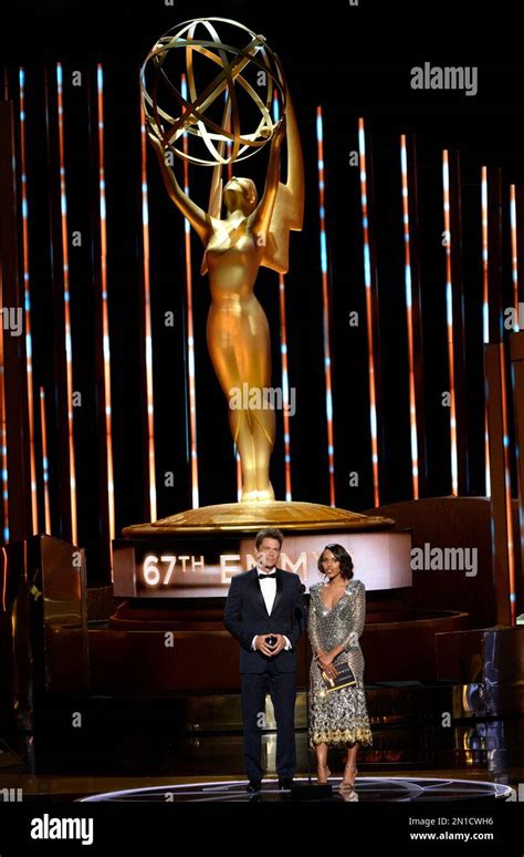 Rob Lowe Left And Kerry Washington Present The Award For Outstanding