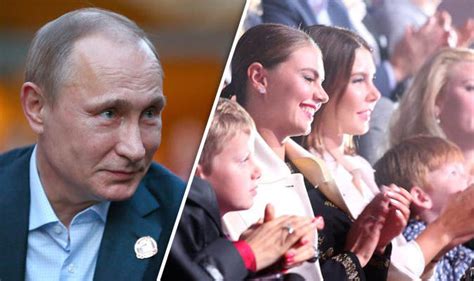 Putin's 'lover' Alina Kabaeva pictured with children wearing wedding 