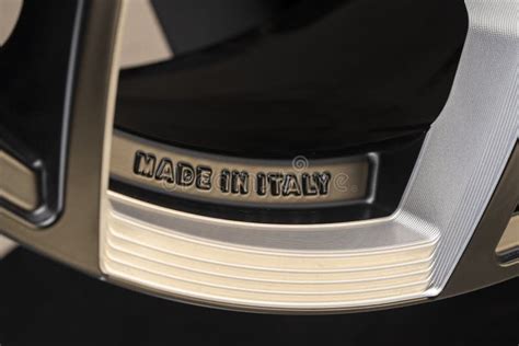 Made In Italy Text On The Rim Of A Cast Aluminum Wheel Italian