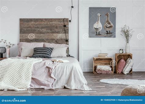 Spacious Feminine Bedroom Interior With Rustic Furniture White Walls