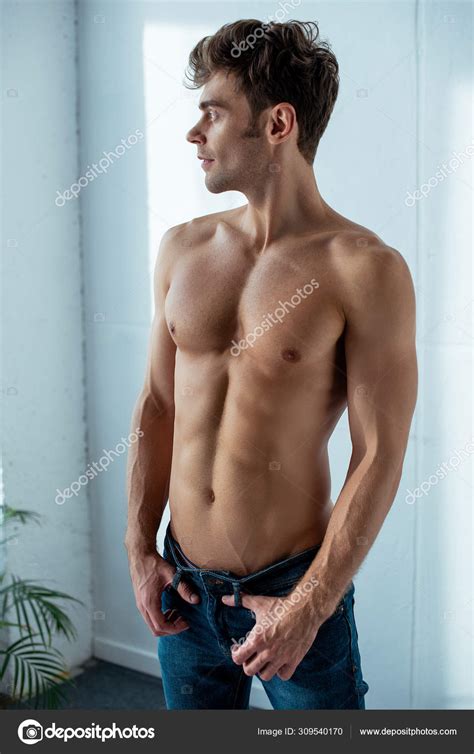 Handsome Shirtless Man Blue Denim Jeans Standing Bedroom Stock Photo By