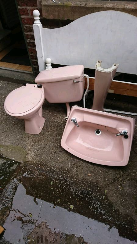 Pink Sink And Pedestal With Taps And Matching Toilet In Leek