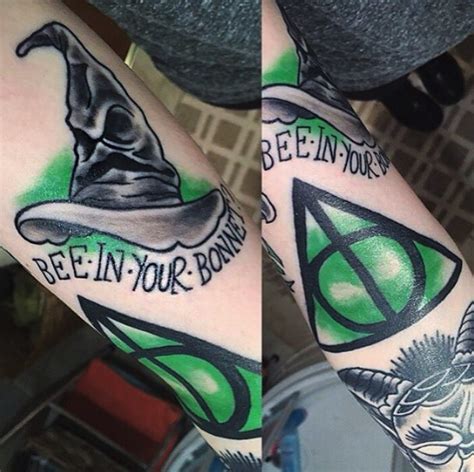 35 Slytherin Tattoos That Don T Totally Ssssuck Slytherin Tattoo