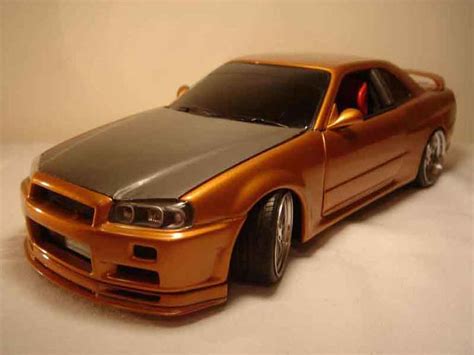 Miniature Nissan Skyline R34 1 18 Autoart R34 Orange Carbon Kit Nos Hot Sex Picture