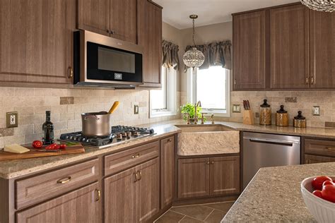 Put your taste for contemporary design front and center with these sleek laminate kitchen cabinets featuring slab doors, dramatically contrasting finishes, and decidedly modern accents. Custom Laminate Kitchen Cabinet Doors | Kitchen Magic