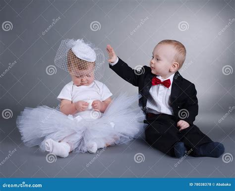 Cute Boy And Girl In Wedding Dress Stock Photo Image Of Male Little
