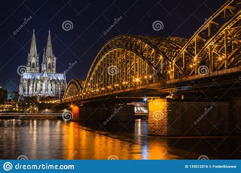 Cologne Skyline With Cologne Cathedral And Hohenzollern Bridge At Night