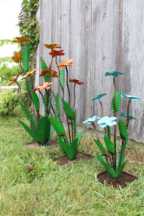Metal garden art can be whimsical, playful or or even formal. 28" Recycled Metal Daisy Yard Decor