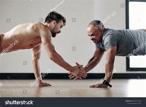 Strong Men Giving Each Other High Stock Photo 1850154703 Shutterstock