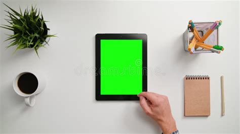 A Finger Scrolling On The Green Touchscreen Stock Image Image Of