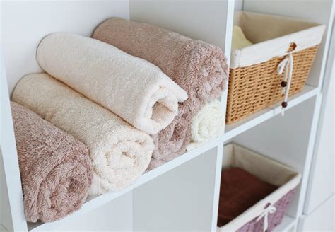 Roll the towels for a streamlined display. Ingenious Bath Towel Storage in Your Bathroom