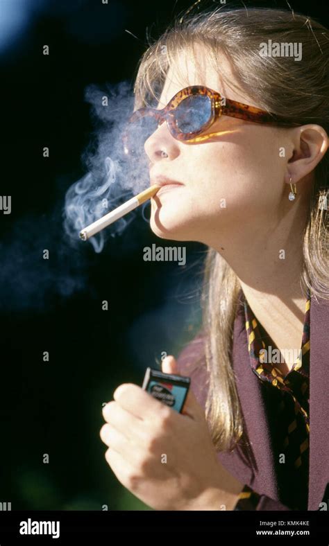 Woman Smoking Cigarette Stock Photo Alamy