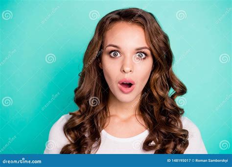 close up stunned surprised puzzled funny redhead middle aged woman popping eyes camera fold lips