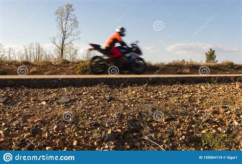Pavement Of A Road At Ground Level By A Motorcycle Rider Stock Image