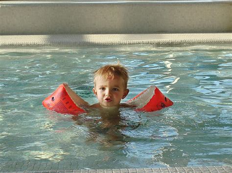 Water Wings Child Boy Swim Face Blond Swimming Pool Pretty