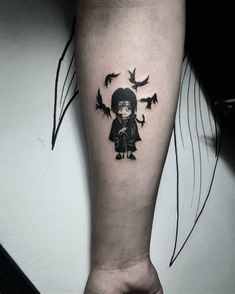 A Person With A Black And White Tattoo On Their Arm