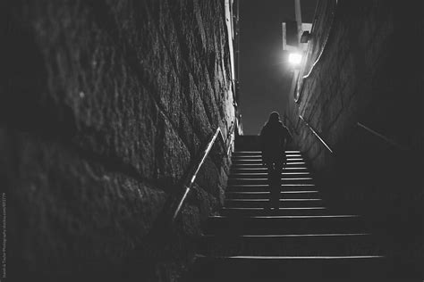 Woman Walking Up Stairs By Stocksy Contributor Itla Stocksy