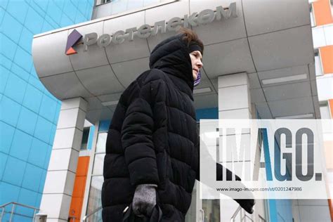 Russia Moscow January 30 2023 A Woman Walks Past The Offices Of Rostelecom Russia S Largest