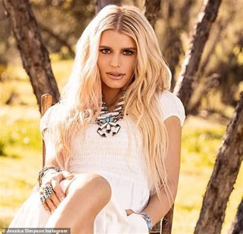 Jessica Simpson Shows Off Her Toned Legs In A White Dress While