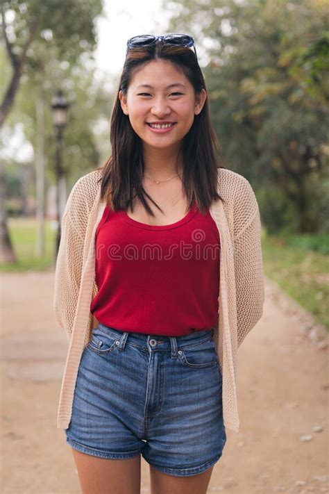 Beautiful Young Asian Woman Looking At Camera Stock Photo Image Of