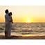 Couple Girl Guy Wind Sea Sand Beach Surf Sunset Evening  Wallpapers13com