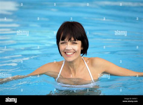 Cheerful Woman In Swimming Pool Stock Photo Alamy