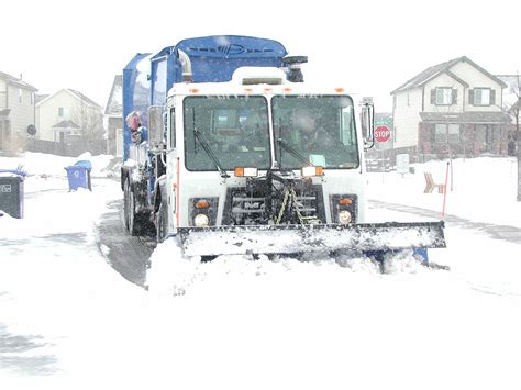 Garbage Truck Snow Plows Deployed In Loveland