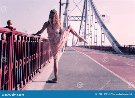 professional nice woman lifting her leg up stock image image of person dancewear 127813579