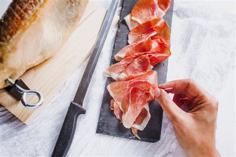 Jamon Serrano Traditional Spanish Ham Slicing Of Dry Cured Ham In Spain Stock Image Image Of