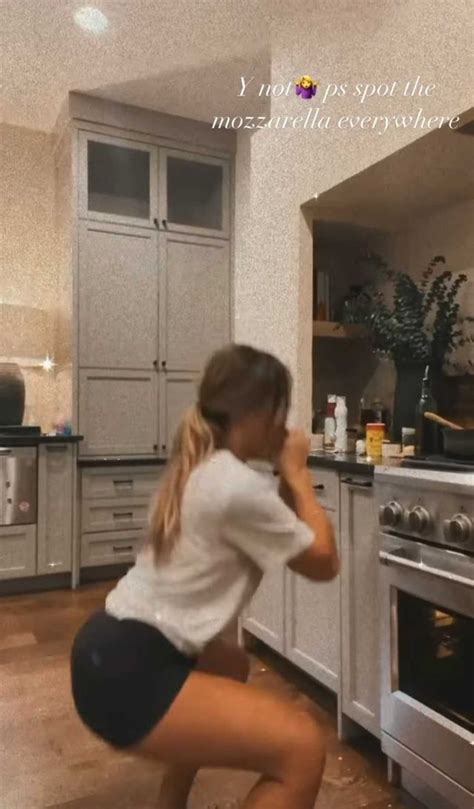 see jessie james decker show off her toned legs in a kitchen workout