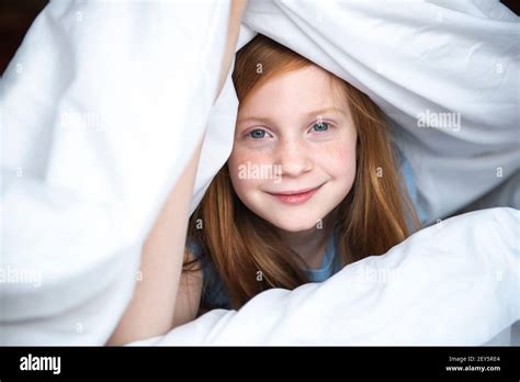 Peeking Out From Under The Bed Hi Res Stock Photography And Images Alamy