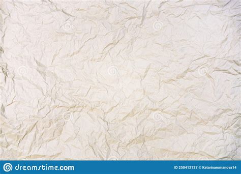 Beige Crumpled Sheet Of Kraft Paper With Texture Royalty Free Stock