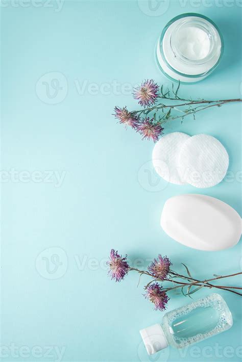 Cosmetic Products And Dry Flowers On Blue Background 5889427 Stock