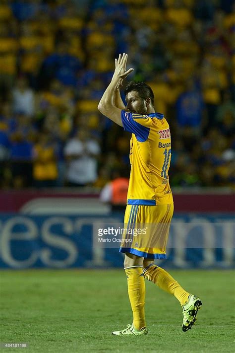 andre pierre gignac of tigres greets the fans as he leaves the field during a 5th round match
