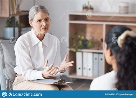 You Are Not The Problem Shot Of A Mature Psychologist Sitting With Her