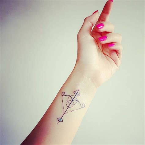 Sagittarius Zodiacal Sign Tattoo On The Left Forearm