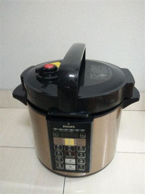 »» the electric pressure cooker enters the rice cooking mode by default. Philips ME Computerized Electric Pressure Cooker HD2139/60 ...