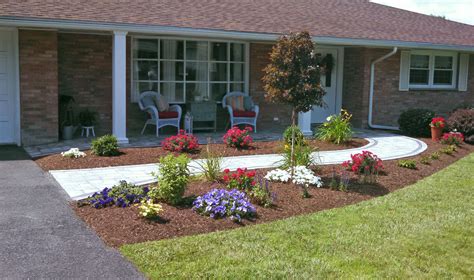 Walkway With Contrasting Border Planting Using Annuals And Perennials