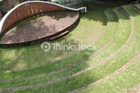 Small Amphitheater Made With Red Bricks And Seats Arranged In A