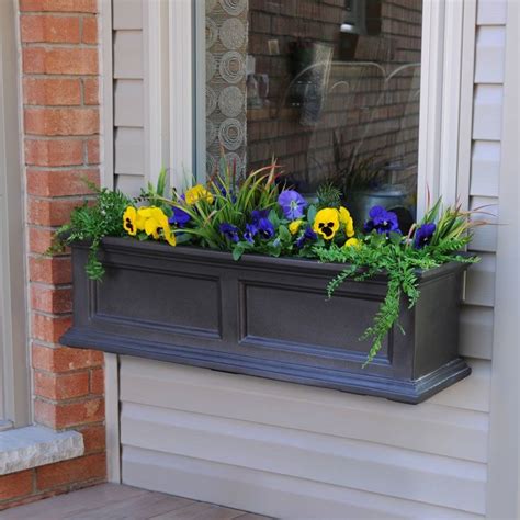Is a lush and decorative addition to your window. This Fairfield Self-Watering Plastic Window Box Planter ...