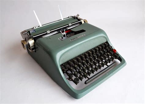 Vintage Teal Olivetti Studio 44 Portable Typewriter Oldschooltypers