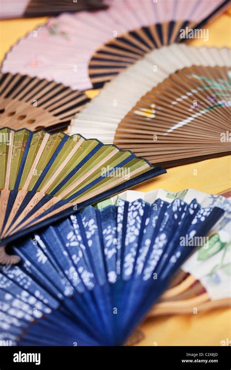 Collection Of Traditional Chinese Fans With A Variety Of Colors And