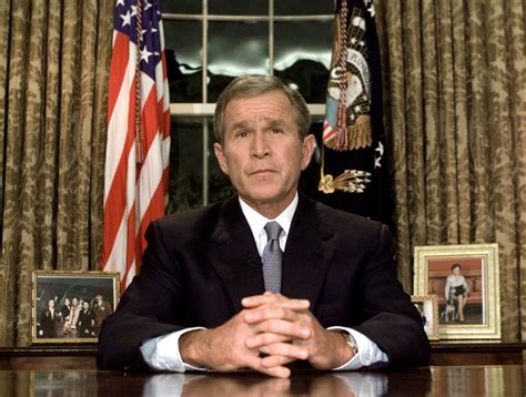 President George W Bush Addresses The Nation From The Oval Office Of