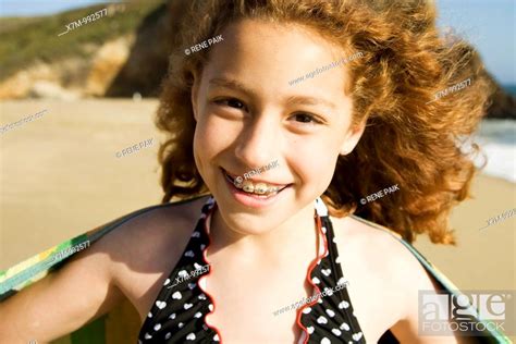 Happy Young Mixed Race Mexican And Caucasian Girl At A Beach In Santa Cruz California Stock